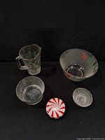 All five holiday glassware pieces arranged together