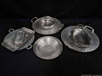 Group shot of all hammered aluminum pieces