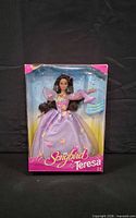 Front of sealed Songbird Teresa doll box showing doll and accessories