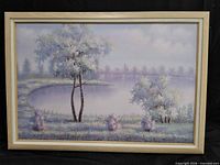 Front view of framed landscape painting