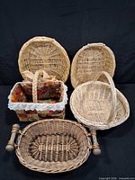 Group shot of five wicker baskets showing overall variety