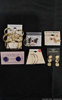 All six earring pairs displayed on original cards
