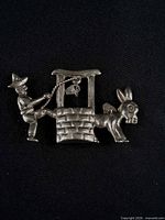 Front view showing detailed donkey, well and man figures