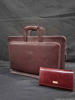 Front view of leather briefcase and wallet