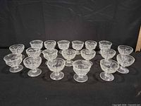 group of eighteen clear footed dessert cups