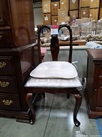 Full front view of the wooden dining chair