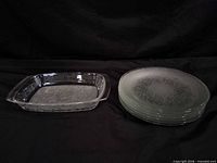 rectangular tray and stacked round plates