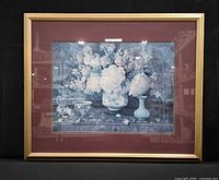 Front view of framed floral still life print showing image, mat and frame