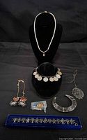 Group shot showing all eight jewellery items