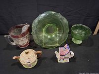Group shot of all five items arranged on table