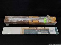 Two boxed Morning Star blinds stacked with protective wrap