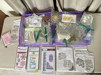 Overall lot view showing boxed and loose dies