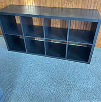 Front view showing eight compartments and overall structure