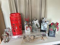 Full lot showing seven lanterns/luminaries, LED branch lights and twig picks