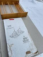 Pine wood rack frame and original IKEA Abudans box on table