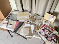 Overall view of all scrapbooking contents on table