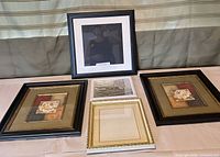 Group shot of all five picture frames displayed on table