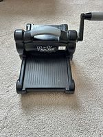 Front view showing Big Shot logo, cutting platform, handle