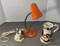 All three items: Wardle candlestick, Boston Terrier figurine, orange gooseneck lamp