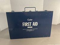 Front view showing Curity FIRST AID branding and overall condition