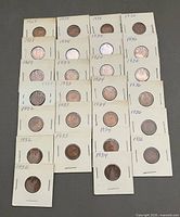 Front view showing full collection of 28 flipped coins