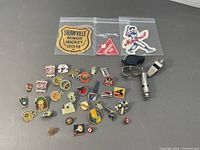 Full lot showing pins, patches and whistles
