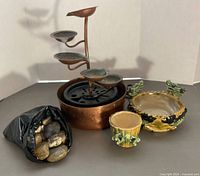 All items: copper fountain with pump, bag of stones, two Majolica planters