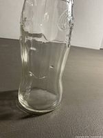 close-up of lower bottle showing internal glass filament