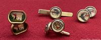 Overall lot showing all cufflinks and tie clip