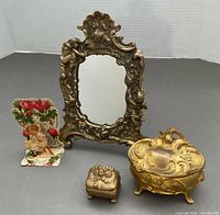 Group shot of both jewelry caskets, vanity mirror, and Valentine card