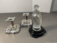 Statue and both candlesticks group view