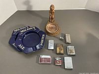 Group shot of all lighters and ashtrays