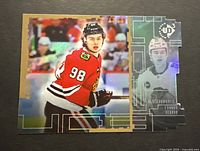 Front of Connor Bedard UD3 card showing design and condition