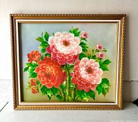 Front view of framed floral canvas print