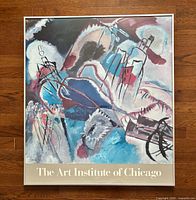 Full view of framed Kandinsky print including frame and caption