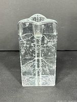 Front view of triangular bubble glass candle holder