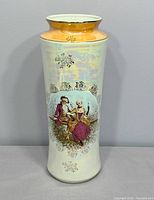 Full view of vase front showing courting couple design and lustre finish