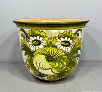 Front view showing overall form and painted floral design