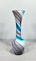 Front view of art glass swirl vase