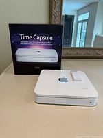 Time Capsule base station, Apple Remote, retail box