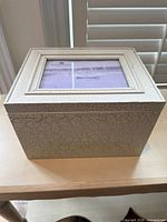 Top view showing crackle-finish box and built-in 5×7 frame on lid