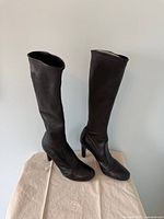 Full view of both boots standing upright front angle