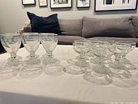 All 14 Boopie pattern glasses arranged on table