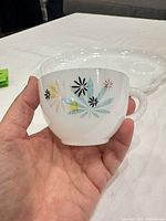Atomic Flower snack cup showing starburst design