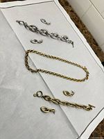 Overall view of necklace, bracelet and earrings