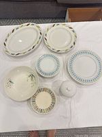 Group shot of several dinnerware pieces showing patterns and forms
