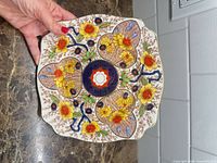Square scalloped porcelain plate with multicolour Cairo pattern