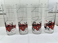 Full set of four glasses showing carriage design
