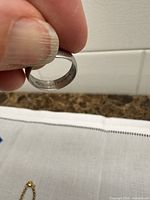 Interior view of sterling silver ring showing hallmark