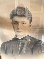 Close view of hand-tinted female portrait